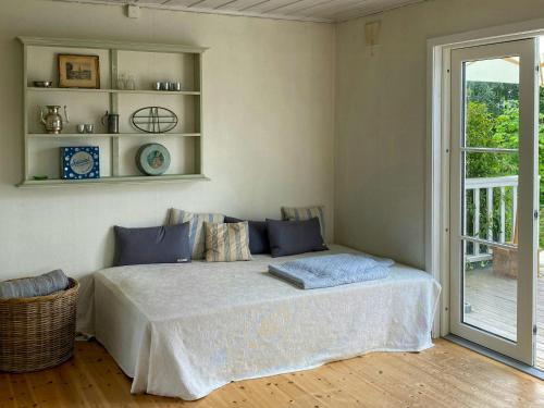 Ένα ή περισσότερα κρεβάτια σε δωμάτιο στο Family House With View Near The Telemark Canal