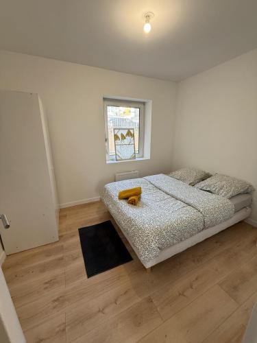 Postel nebo postele na pokoji v ubytování 2 Quai Charles Altorffer - 2E