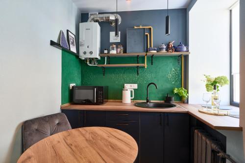 Η κουζίνα ή μικρή κουζίνα στο 24 Mezhygirska str 24, Apartments in historical parts, Podil