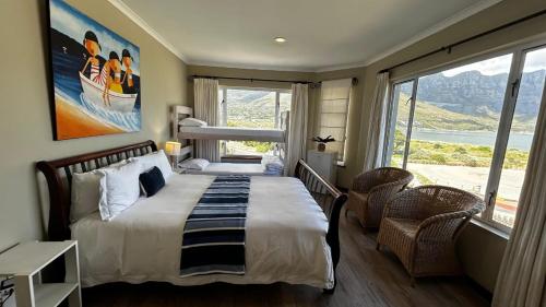 Postel nebo postele na pokoji v ubytování Dune Lodge