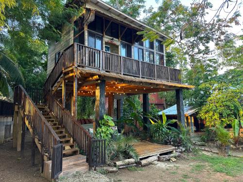 Negril Huts Enchantment - Cottages in trees with AC, ocean views, pool, Sea access
