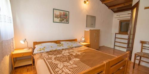 En eller flere senge i et værelse på House Jasna Punta Kriza