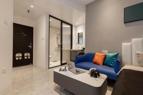 Et opholdsområde på Shanghai Hills&Sunflower Ultra Horizon Hotel & Suite