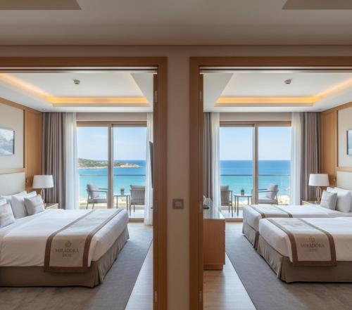 Un pat sau paturi într-o cameră la Miradora Luxe Hotel & Spa