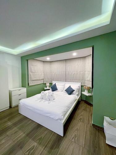 Ένα ή περισσότερα κρεβάτια σε δωμάτιο στο Cozy room at Hillside2 Condo