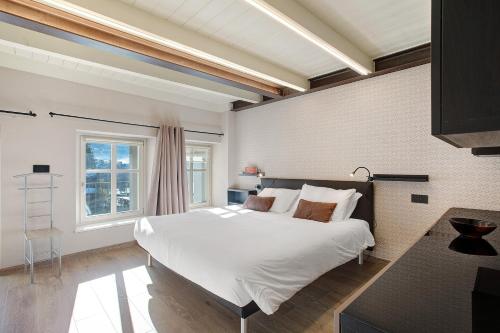 Postel nebo postele na pokoji v ubytování La Maison de Ida - Centro Storico