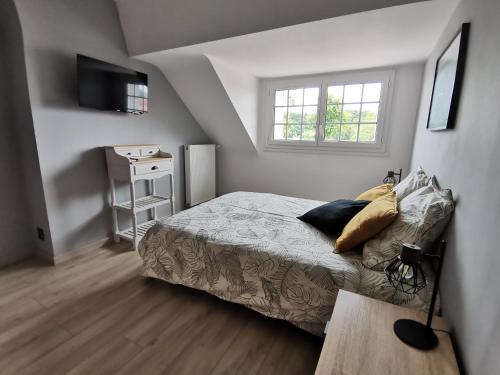 Voodi või voodid majutusasutuse chambres d'hôtes près du zoo de Beauval toas