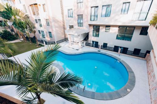 Πισίνα στο ή κοντά στο Peaceful Nest Apartment