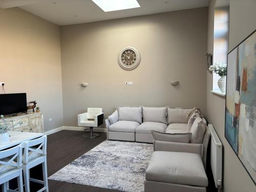 Et opholdsområde på Patience Cottage, an old bothy cottage