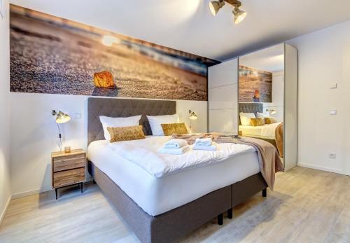 Ένα ή περισσότερα κρεβάτια σε δωμάτιο στο Bernsteinquartier BQ0556 Meeresgold