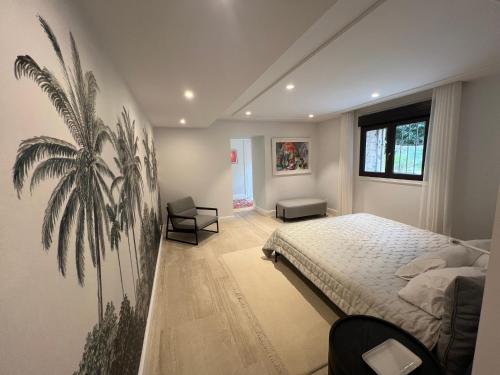 Un pat sau paturi într-o cameră la Villa Maria