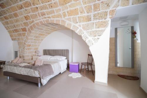 Postel nebo postele na pokoji v ubytování Sweet Home Arco Porta Luce