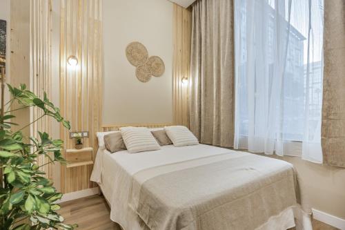 Ένα ή περισσότερα κρεβάτια σε δωμάτιο στο Apartamentos Brisas de Cádiz 2