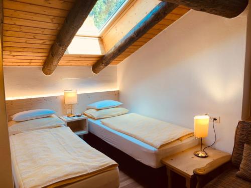 Ένα ή περισσότερα κρεβάτια σε δωμάτιο στο Chalet Marianna