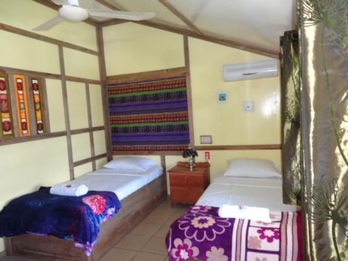 Llit o llits en una habitació de cocopeleinn2