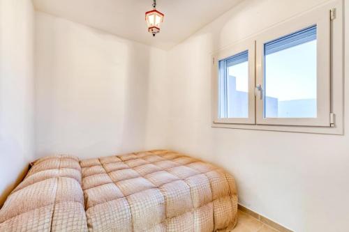 En eller flere senge i et værelse på Dimore di Matilde -Attico Vistamare