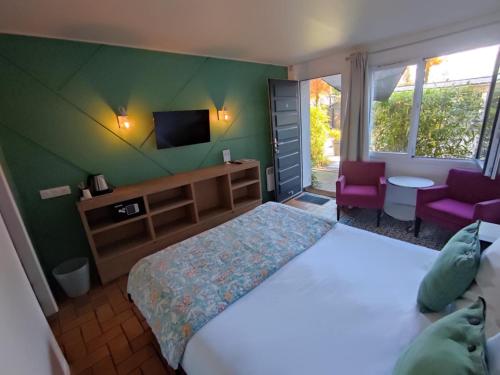 Krevet ili kreveti u jedinici u okviru objekta Hôtel Monet