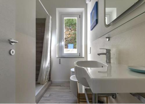 Billede fra billedgalleriet på Trilocale Giglio - vista sul mare e sui tramonti i Pomonte