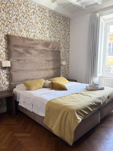 Ένα ή περισσότερα κρεβάτια σε δωμάτιο στο Ah Suite Trevi