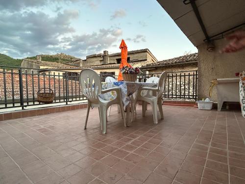 a table and chairs on a balcony with a view at Zi Maria in Roccasecca