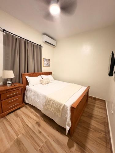 Ένα ή περισσότερα κρεβάτια σε δωμάτιο στο Doña Dinde Vacacional