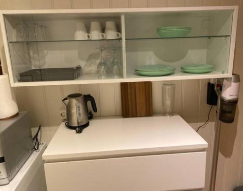 Η κουζίνα ή μικρή κουζίνα στο Koselig 2 roms leilighet Norheim, Haugesund