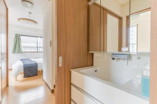 Ένα μπάνιο στο 豪华家庭套房5F大阪城徒歩可能 谷町四丁目駅徒歩1分 Tanimachi 5F