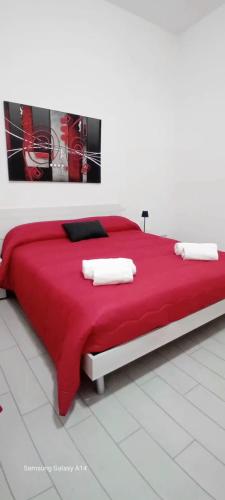 Ένα ή περισσότερα κρεβάτια σε δωμάτιο στο Terramare