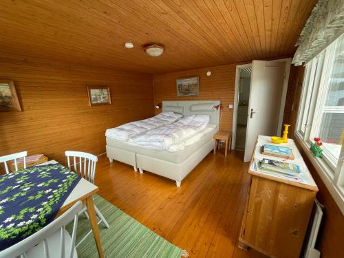 Ένα ή περισσότερα κρεβάτια σε δωμάτιο στο Thilens cottage by lake Bunn