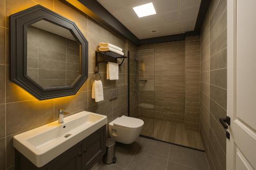 Et badeværelse på Loft Airport Hotel