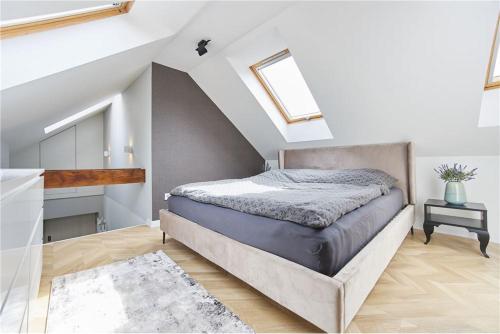 En eller flere senge i et værelse på Apartament ORKANA 10