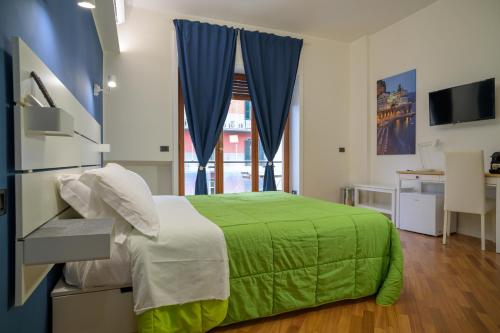 Una cama o camas en una habitación de B&B Amalfi Coast Salerno