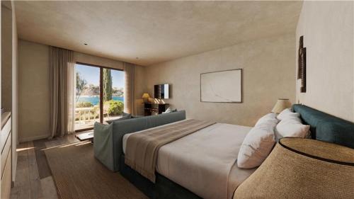 Postel nebo postele na pokoji v ubytování Zannier Île de Bendor