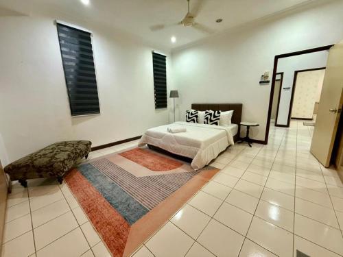 Ένα ή περισσότερα κρεβάτια σε δωμάτιο στο The Nest2 Cozy Home Seksyen 7 Shah Alam