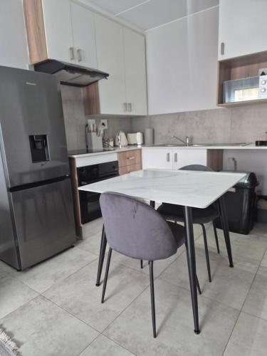 Η κουζίνα ή μικρή κουζίνα στο Village Vista at Atlasville 10km from OR Tambo