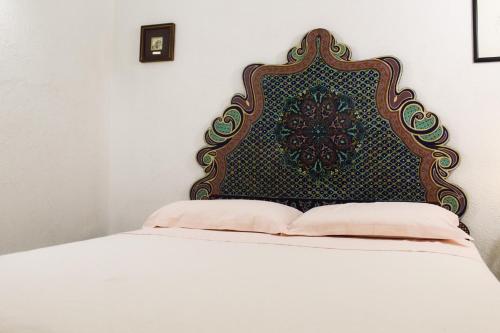 Ένα ή περισσότερα κρεβάτια σε δωμάτιο στο Casa Maricla - Marea Stays Collection