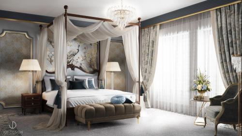 Postel nebo postele na pokoji v ubytování Taj Hessischer Hof, Frankfurt