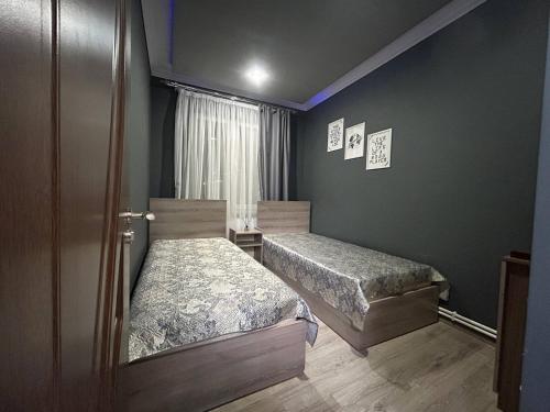 Ένα ή περισσότερα κρεβάτια σε δωμάτιο στο SD House