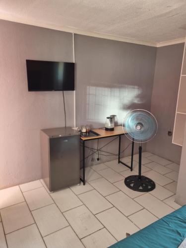 Μια τηλεόραση ή/και κέντρο ψυχαγωγίας στο Phadimane guest house