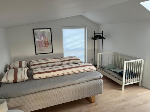 Ένα ή περισσότερα κρεβάτια σε δωμάτιο στο Schweden Chalet, Haus 1