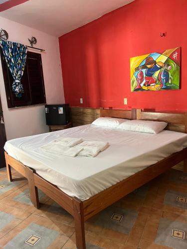 Postel nebo postele na pokoji v ubytování Pousada Rosa Mistica