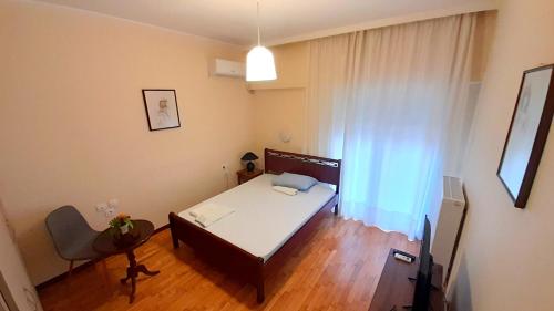 Ένα ή περισσότερα κρεβάτια σε δωμάτιο στο Ήσυχο και κεντρικό διαμέρισμα