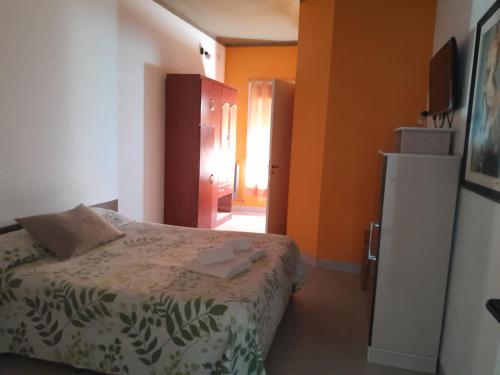 Кровать или кровати в номере Hotel Residencial Lo de Pepe