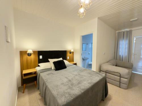 En eller flere senge i et værelse på Juquehy Studios 2, 3 e 4