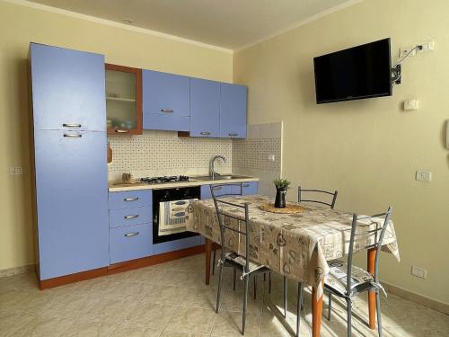 Η κουζίνα ή μικρή κουζίνα στο Cuore di Cairo - Bilocale vicino al centro storico