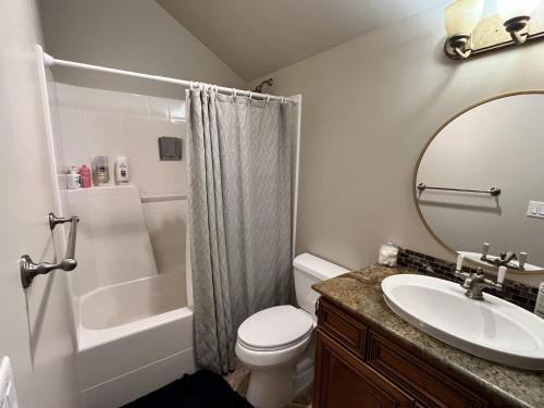 a bathroom with a sink and a toilet and a shower at Leavenworth Mountain, Golf Course, 3br 4 ba in Leavenworth