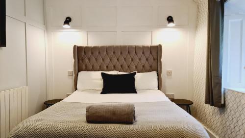 Un pat sau paturi într-o cameră la One Oban