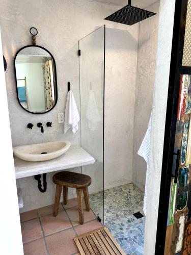 a bathroom with a sink and a mirror at Ojai Serenity Retreat in Ojai