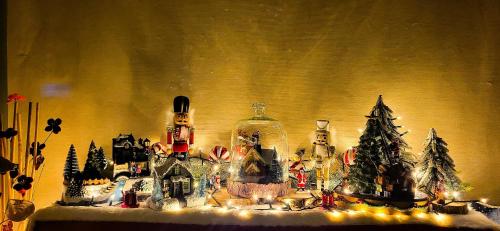 a group of christmas figurines in a glass bottle at Stella del Garda in Lazise