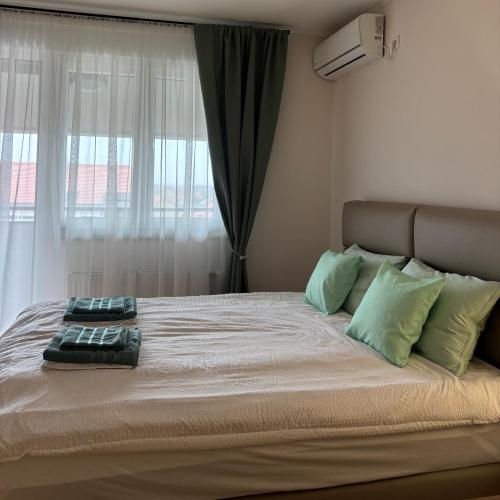 Postel nebo postele na pokoji v ubytování Apartman Panorama